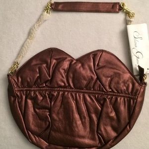 Selena Gomez Bronzed Burgundy Lips-shaped Purse
